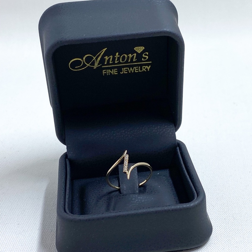 14k yellow gold bypass ring with diamonds